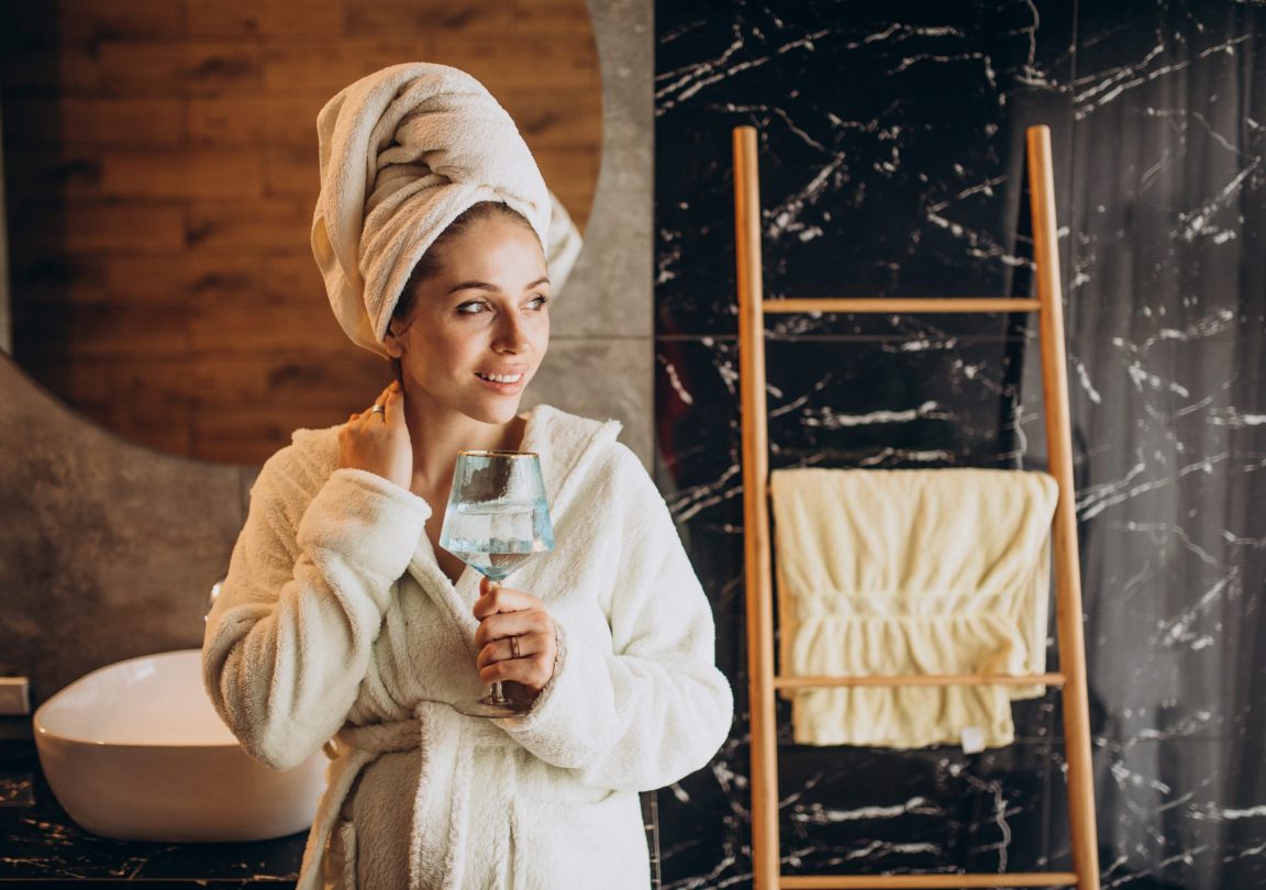 Woman at spa going to take a bath